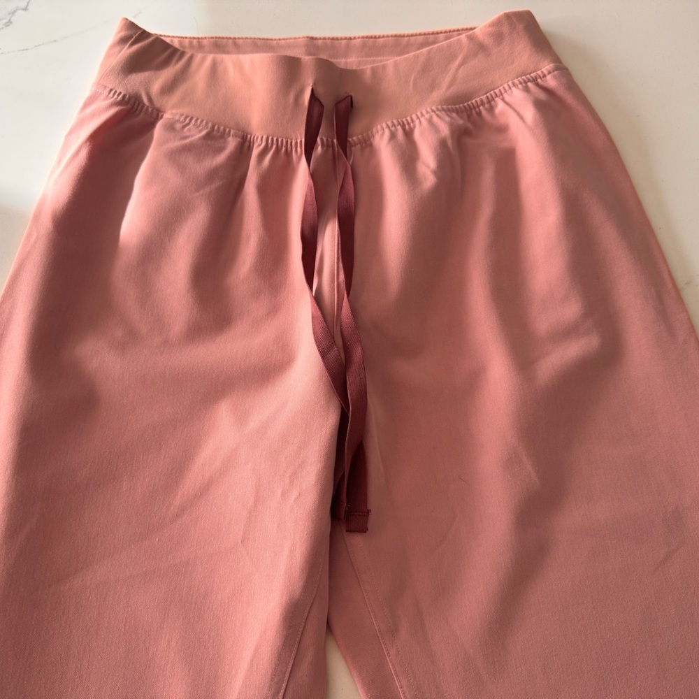FIGs high waisted Livingston scrub pant in color pink sand